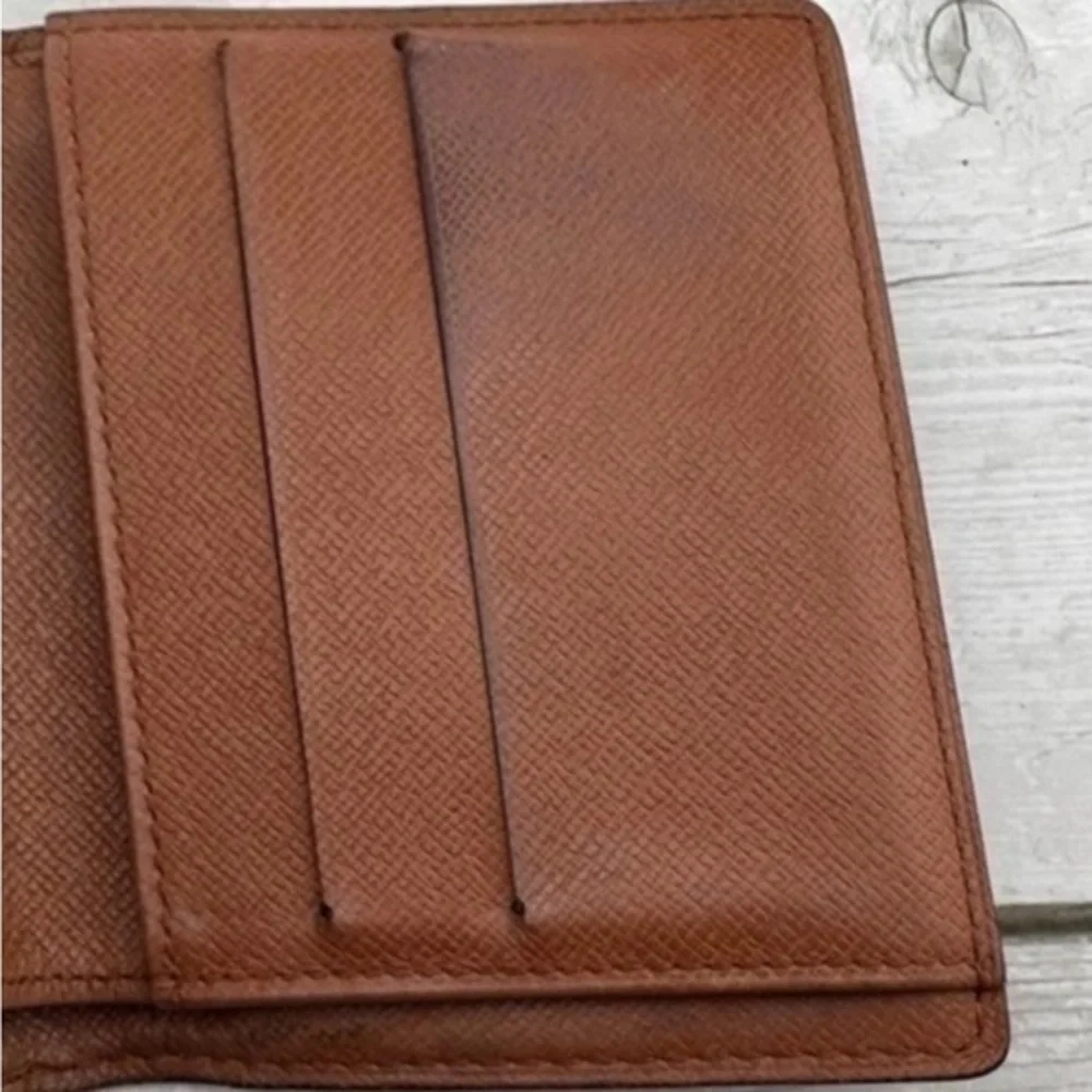 AUTHENTIC Louis Vuitton Elise compact wallet. Monogram canvas.